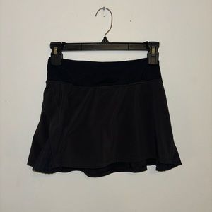 Lululemon off the pleats black tennis skirt size 2